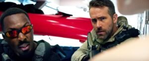 One (Ryan Reynolds) e Seven (Corey Hawkins)